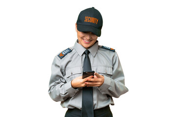 Young safeguard woman over isolated chroma key background sending a message with the mobile