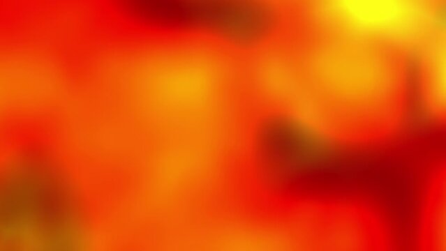 Seamless loop 4K animation of a fluorescent liquid blurry background. Orange, yellow and red motion design for lava and fire.