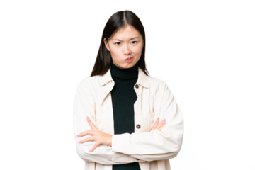 Young Asian woman over isolated chroma key background feeling upset