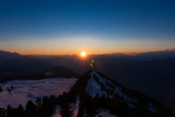 Beautiful sunset in snowy mountains