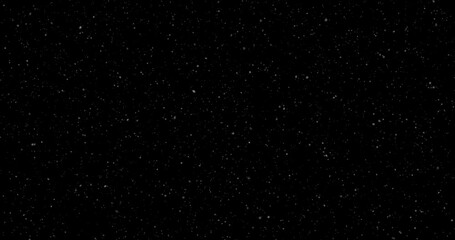 Realistic snowfall snowflakes slow motion falling on clean black loop background.
