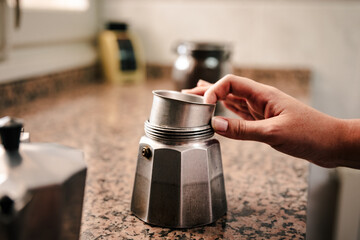Assembling moka pot at home