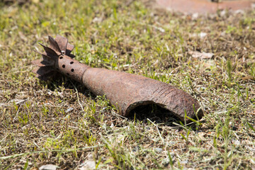 dangerous mortar shell on the ground