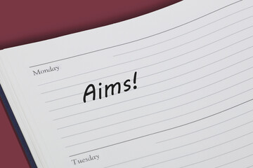 Aims reminder message in an open diary
