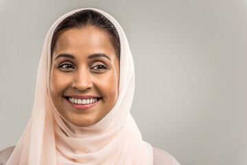 Arabian beautiful woman wearing traditional middle-eastern abaya portrait on isolated background