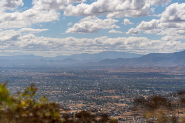 Beautiful view of the large Mexican city of Oaxaca from Monte Alban. View of the endless mountain peaks.