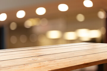 Perspective wooden table and bokeh light background. product display template