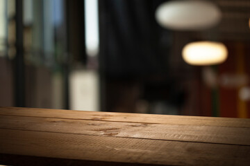 Perspective wooden table and bokeh light background. product display template