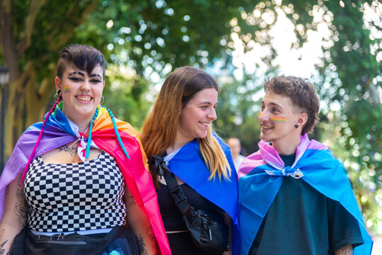 Pride parade participants sharing joyful moments