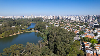 Aerial view of Ibirapuera Park in São Paulo, SP. Residential buildings around. Lake in Ibirapuera Park