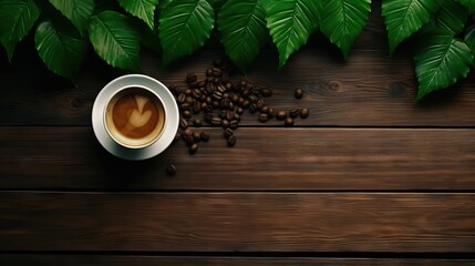 Coffee cup, beans, and green leaves on dark wooden table with copy space.