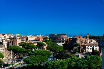 Fototapeta na wymiar Colosseum and citiyscape in rome