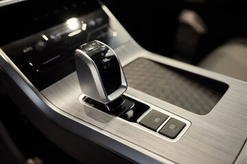 Selector automatic transmission with leather in the interior of a modern expensive car. The...