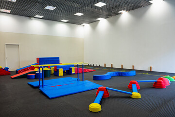 Colorful Gymnastic Equipment in Modern Training Room Kid's Physical Development Zone