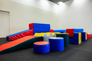 Colorful Gymnastic Equipment in Modern Training Room Kid's Physical Development Zone