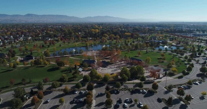 Aerial view of a public park with ponds and views of Boise, Idaho