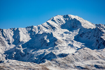 Snowy Mountain Pischahorn in Swiss Alps, Silvretta Alps, located east of Davos, in the Swiss canton of Graubuenden, Switzerland