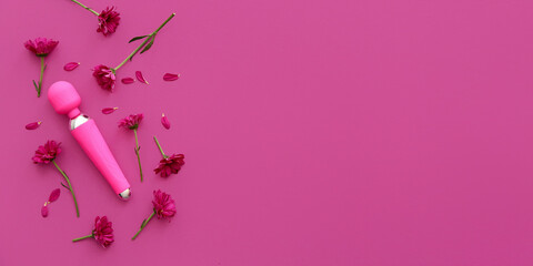 Beautiful flowers and vibrator on pink background with space for text