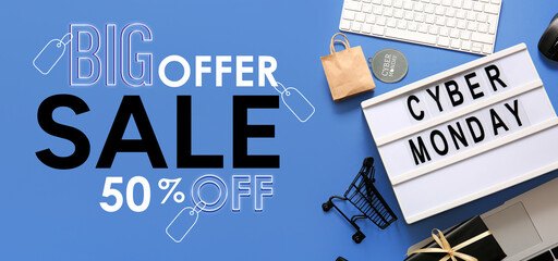Banner for Cyber Monday Sale with small shopping cart, computers and board