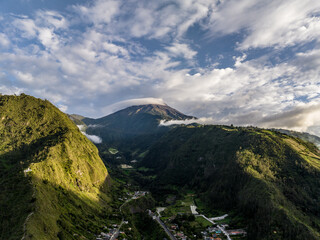 Beautiful aerial view of the Ecuadorian Andes at sunset. City of Banos.
