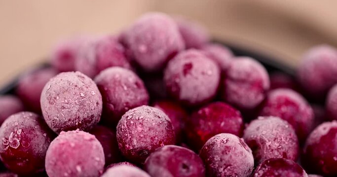 red cherry covered with a thin layer of ice, frozen for long-term storage ripe red cherry