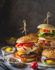 food photography of burgers served at a table with cool lighting