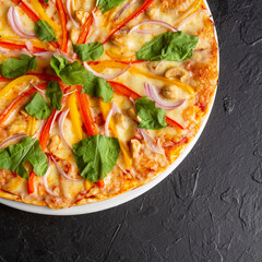 Vegetable pizza, red and yellow paprika, red onion, garlic, arugula, cashew with sesame oil