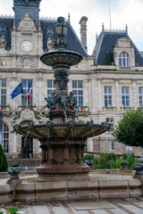 Views of streets and houses of Limoges town, Haute-Vienne department, France with famous porcelain and leather industry, city hall fountain