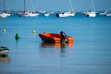 View on Arcachon Bay with many fisherman's boats and oysters farms near Le Phare du Cap Ferret, Cap...