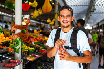 Young adult tourist with a healthy lifestyle smiles