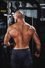 Fototapeta na wymiar Bodybuilder Getting Ready To Weightlifting At The Gym