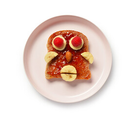 Plate with funny children's breakfast in shape of human face isolated on white background