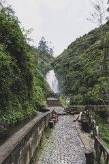 A picturesque waterfall in the forests of Ecuador on the outskirts of the city of Otavalo.