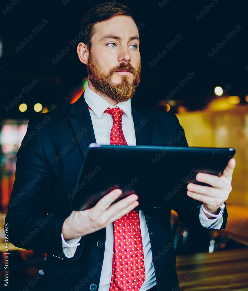 Poster using online banking program on tablet