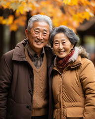 Lifestyle portrait, smiling elderly Japanese couple outdoors, wedding anniversary. promotions on married old age, grandfather and grandmother together, marital love, senior people. Happy marriage