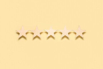 Five stars rating on yellow background. Customer experience concept