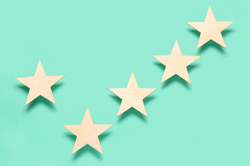 Five stars rating on turquoise background. Customer experience concept