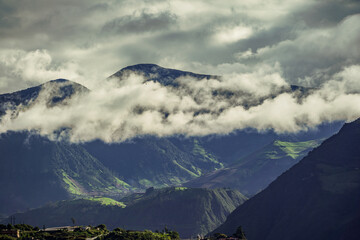 Beautiful view of the volcanoes in the city of Banos, Ecuador. Amazing sunset.