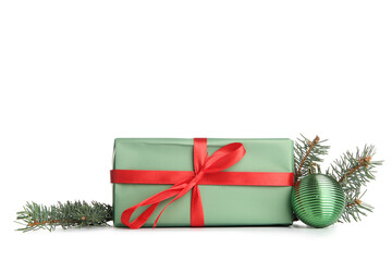 Gift box with Christmas ball and fir branches on white background
