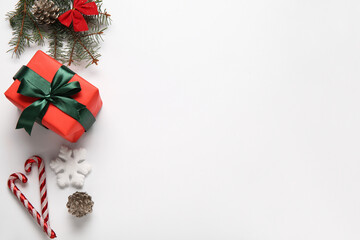 Gift box with Christmas decor on white background