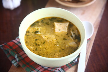bowl of soup with bread