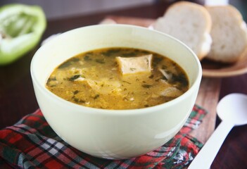 bowl of soup with bread