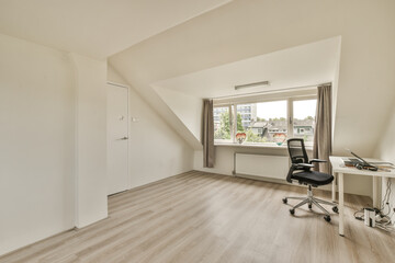 an empty room with a desk, chair and window overlooking the cityscapea photo taken on august 20,...