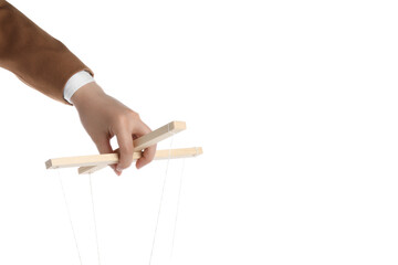 Woman pulling strings of puppet on white background, closeup