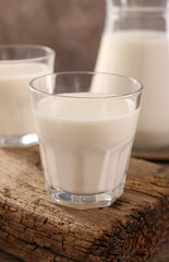 Glasses of fresh milk on table, closeup