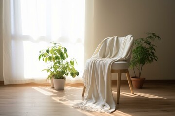 A white blanket on wooden floor near chair and potted plant. Generative AI