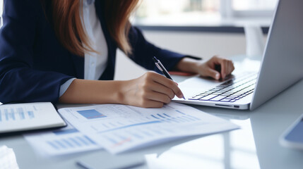 Hands of a woman sitting at her desk and doing financial analysis at work, a close up - Generative AI