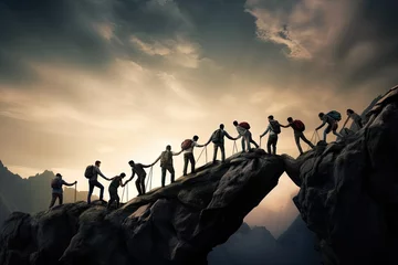 Tuinposter concept business success trekking travel work team helping climbing mountain peak people Group together hand leadership trust collaborating hope support sunset freedom motion active help climb © akkash jpg