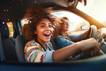 Fotobehang car together driving girlfriends young laughing two friendship girlfriend happiness 20s adult attractive beautiful buddy carefree caucasian city confident copy space © sandra