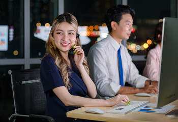 Asian professional successful female businesswomen assistant night shift call center helpline in...